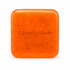 Savon Éclat GlowlyGlow au curcuma et au beurre de karité sur fond blanc